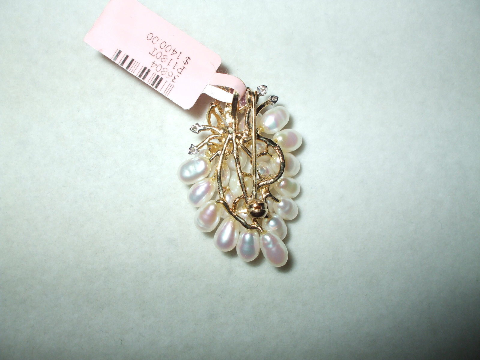 Genuine Freshwater Pearl, Ruby & Diamond Pin 14K yellow gold $1400